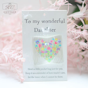 A card that reads "To my wonderful Daughter" featuring a colorful heart design made of small flowers. The message on the card says, "Here's a little Pocket Hugs with Sentiments just for you. Keep it as a reminder of how much I care, for the times when I cannot be there to brighten your home decor.