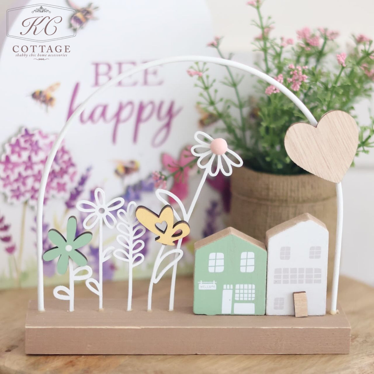Wooden House With Flower Decor and Heart Arch