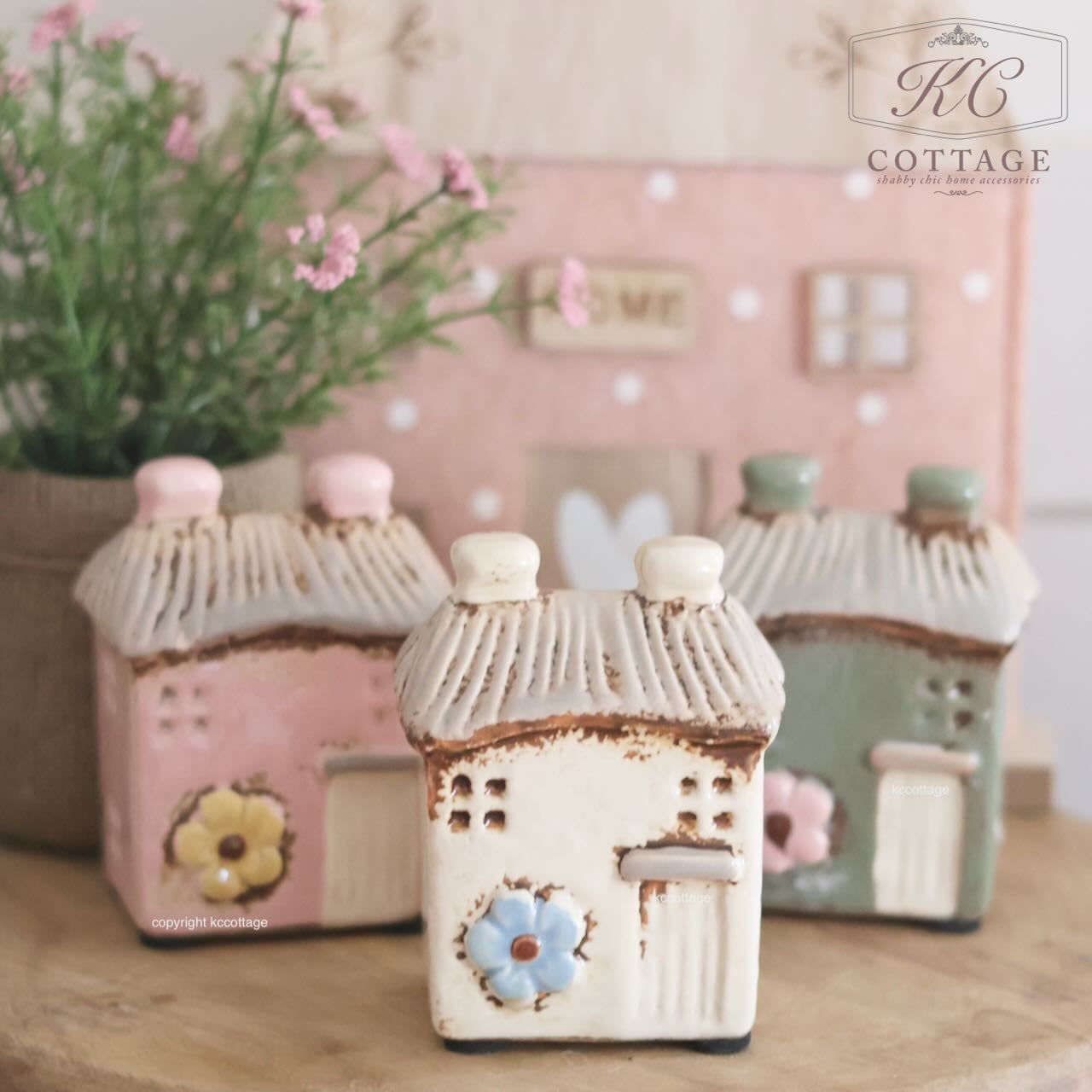 Stoneware House With Embossed Flower Ornament