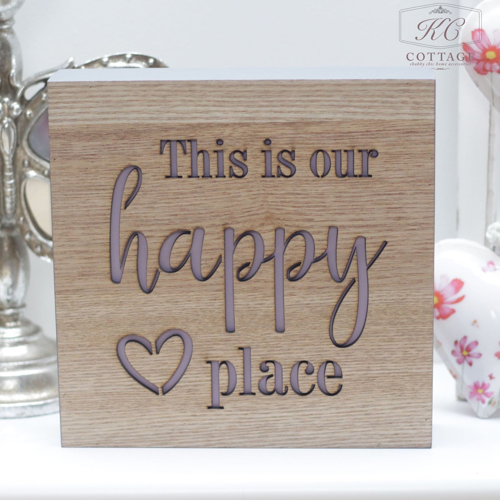 Wooden Square Sign that reads This is our happy place